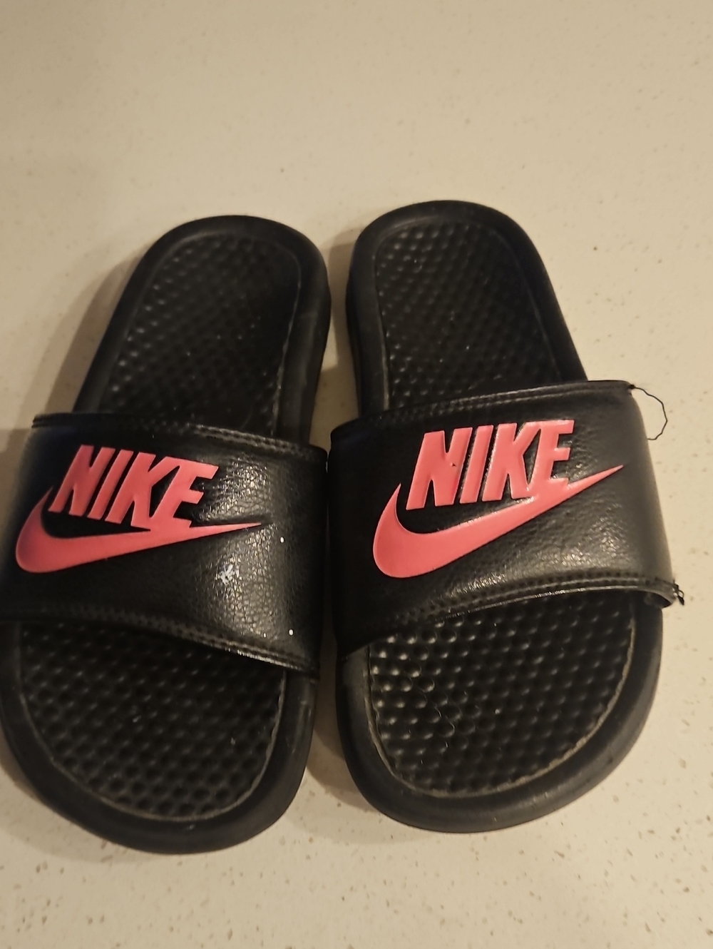 Nike Black Slides with Pink Swoosh and Logo